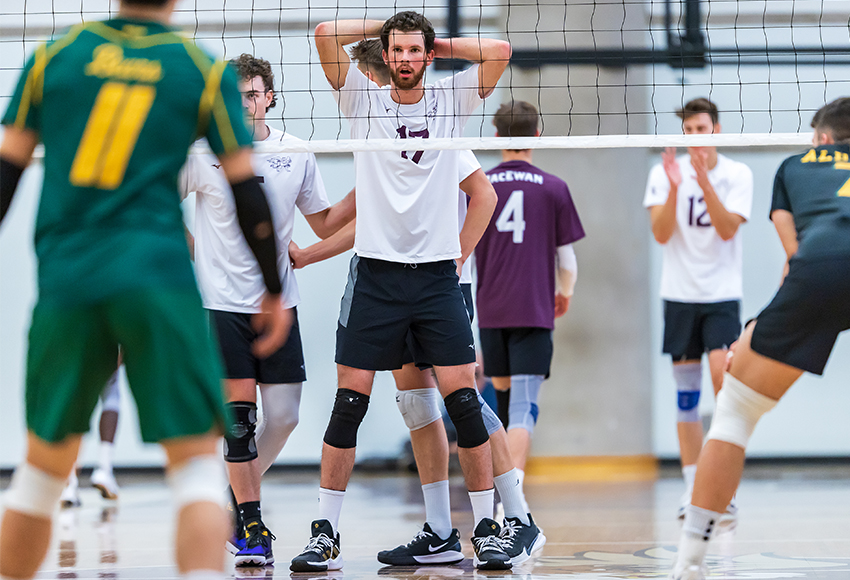 Mark Alexander waits for a teammate's serve during a match against Alberta earlier this season. The veteran middle blocker is playing in his final regular season home games this weekend vs. Calgary (Robert Antoniuk photo).
