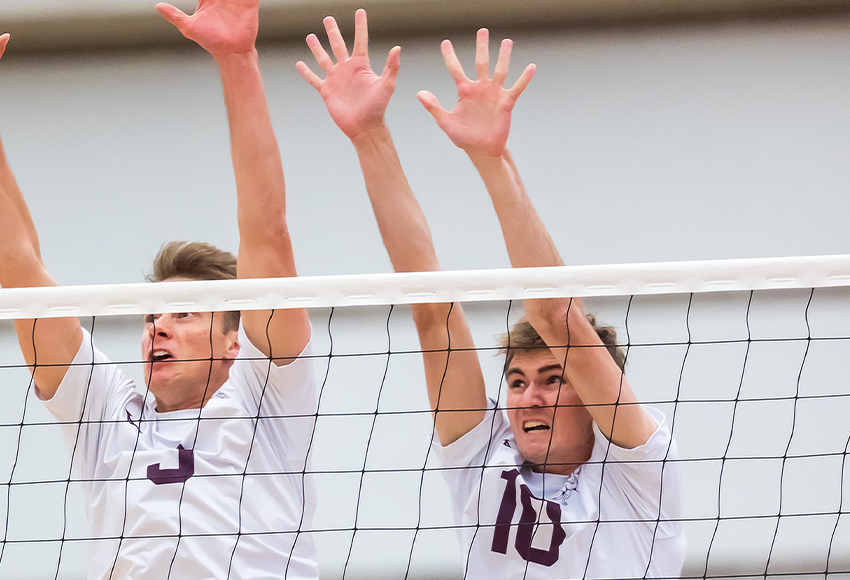 Seth Birkholz, right, closed out the third set on Friday from the service line with back-to-back aces (Robert Antoniuk photo).