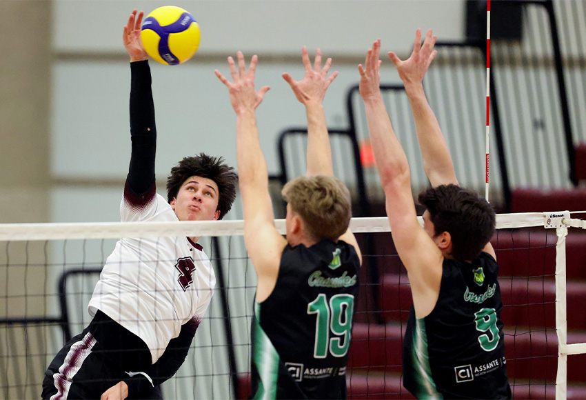 Jarod Inia hits against a double UFV block on Saturday. He finished with seven kills (James Maclennan photo).