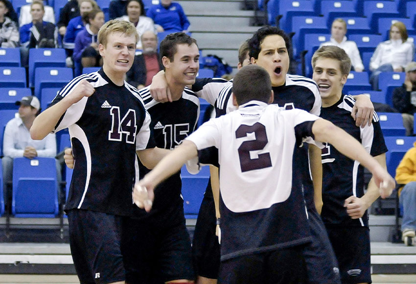 The MacEwan Griffins men's volleyball team celebrates a point during a 2008-09 regular season match. They finished the season in legendary fashion by defeating Cégep de Limoilou in the CCAA final for the only national title in program history.