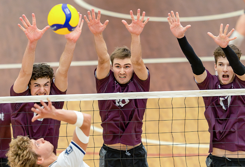 Mitchell Croft, Seth Birkholz and Daylan Laszlo put up a triple block against Trinity Western on the weekend. The Griffins lost 3-1 on Saturday (Robert Antoniuk photo).