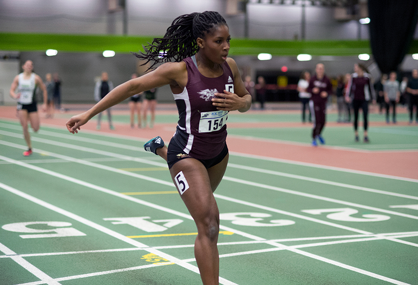 MacEwan's Amanda Ntiamoah cruises to a comfortable win in the women's 300 metres, helping the Griffins claim the women's title at Saturday's MacEwan Invitational (Len Joudrey photo).