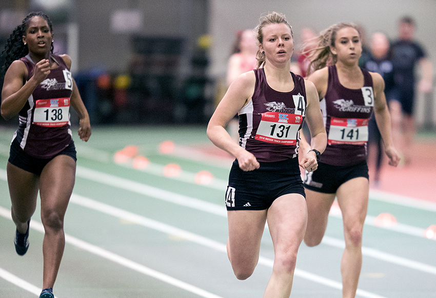 Nikita Case, centre, leads teammates Valerie Schlottke (right) and Amanda Nitamoah (left) to the finish line in the women's 300-metre dash on Friday. It was a historic podium sweep - the first in ACAC indoor track history - for the Griffins (Robert Antoniuk photo).