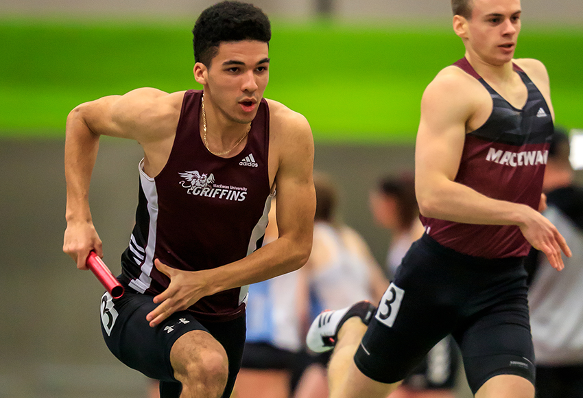 Connor Swaby, left, takes the baton from teammate Thomas Cross-Trush in the men's 4x400 relay at the MacEwan Invitational in January. Both will test their games at the 600 in Saturday's ACAC Running Room Grand Prix #2 in Red Deer (Robert Antoniuk photo).
