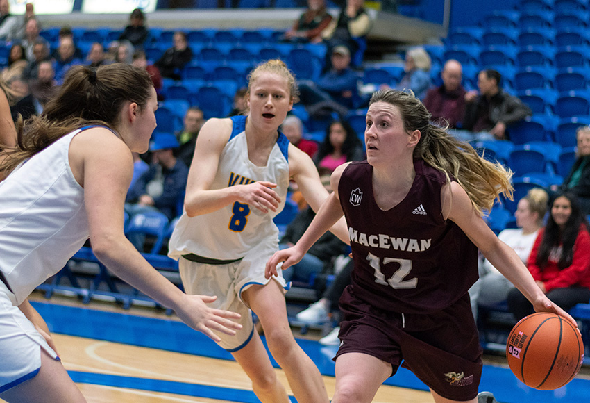 Kayla Ivicak looks for an opening against Victoria on Friday night. She posted double doubles in the final two games of her university career to tie her own school record for most by a Griffin in a Canada West season (Full Stroke Photography).