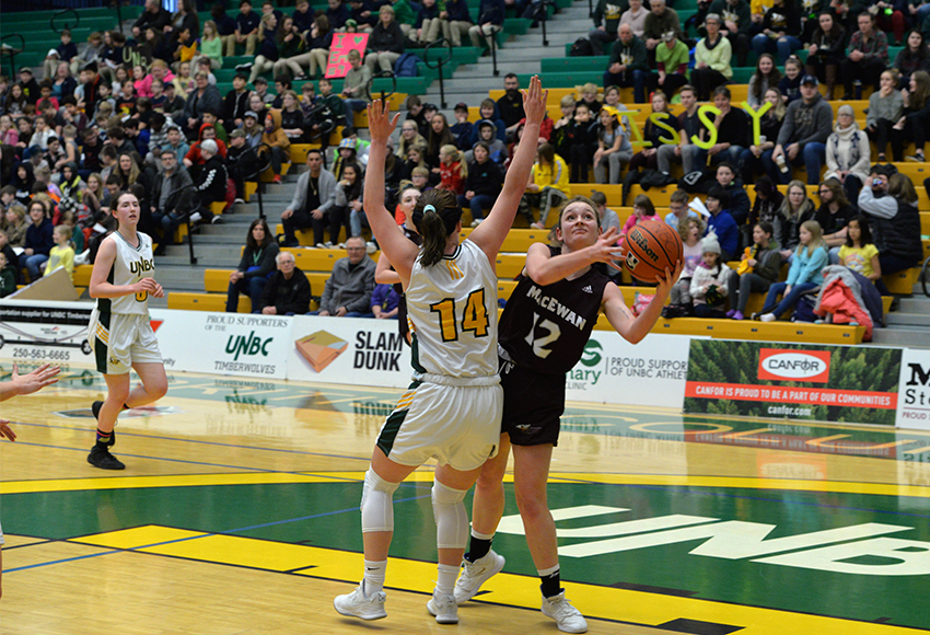 Noelle Kilbreath drives to the hoop in a packed UNBC gym on Friday (Courtesy UNBC).
