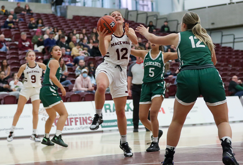 Noelle Kilbreath drives to the hoop on Friday night. She led the Griffins with 14 points in just 24 minutes on the court due to some early foul trouble (Eduardo Perez photo).