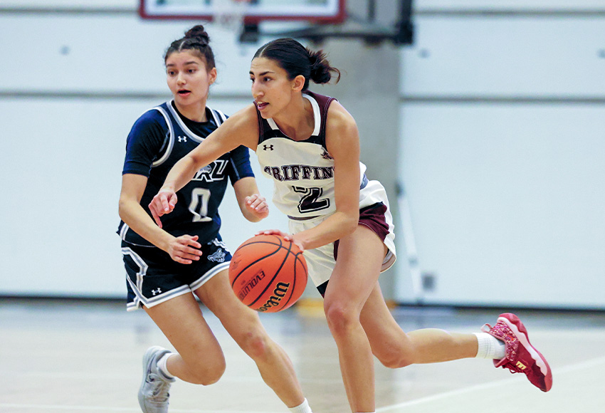 Allie Spenrath carries the ball up court for the Griffins in Friday's home opener (James Maclennan photo).