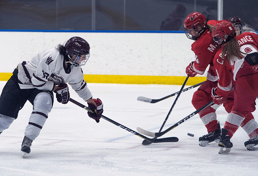 Chantal Ricker, seen battling against SAIT on Friday night in Edmonton, scored one of MacEwan's five goals in a 5-2 victory over the Trojans in Calgary on Saturday (Matthew Jacula photo).