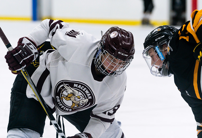 Chantal Ricker lines up for a faceoff against Olds during a recent game (Matthew Jacula photo).