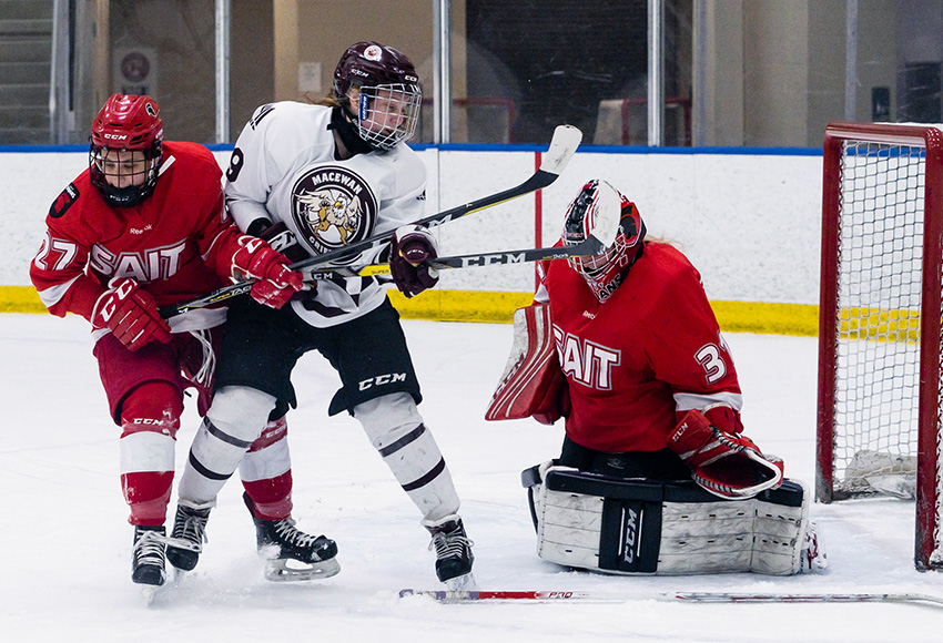 Jordyn Reimer gets a chance on SAIT goalie Elisha Oswald in a game earlier this season. The fourth-year forward is getting rewarded offensively for her hard work (Matthew Jacula photo).