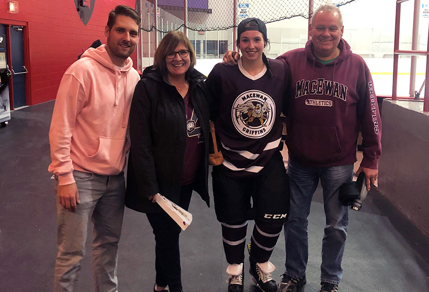 Former MacEwan women's hockey player Jenna Thompson poses for a picture with her family - brother Bret Thompson, left, mom Doris Dekleva and dad Geoff Thompson (Photo courtesy of Jenna Thompson)