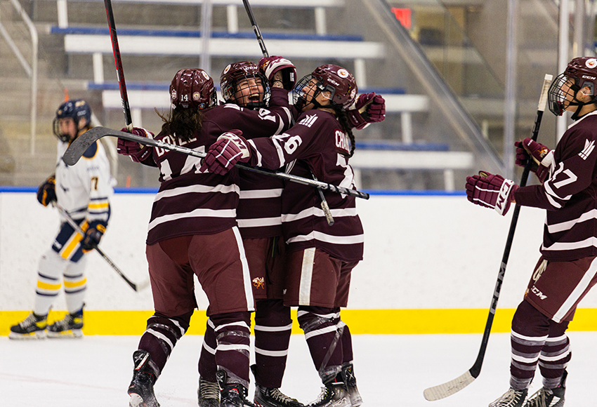 Hailey Maurice and teammates celebrate after she opened the scoring for MacEwan in the first period on Friday night (Joel Kingston photo).