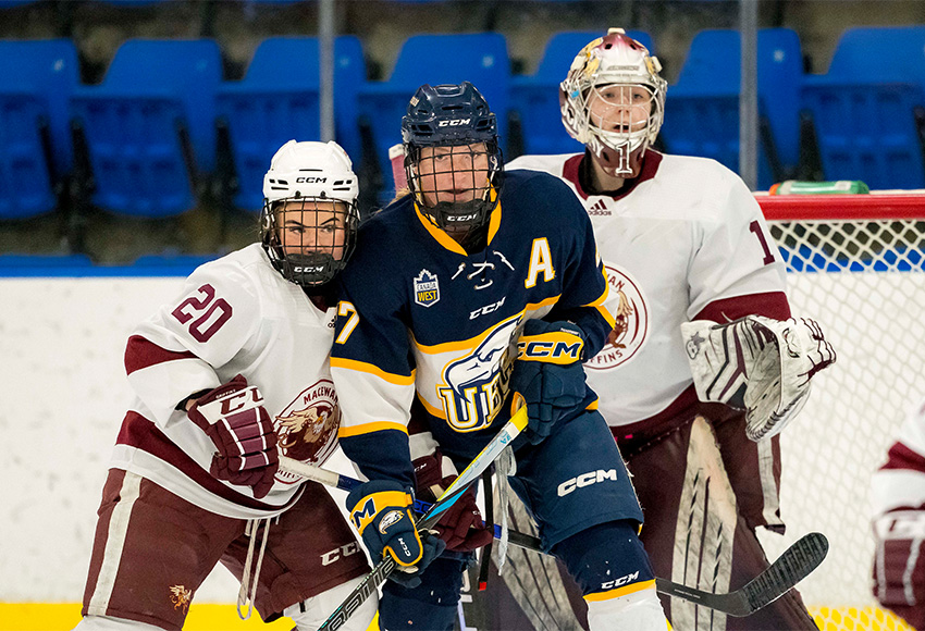 MacEwan's Shaelyn Hopkins keeps UBC's Mackenzie McCallum in check in front of goaltender Lindsey Johnson on Friday (Bob Frid photo).