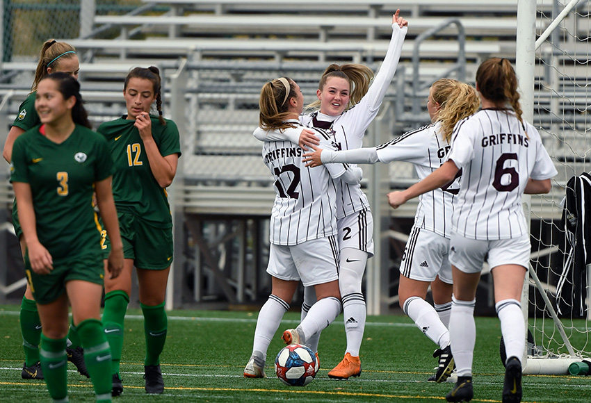Meagan Lemoine celebrates with Salma Kamel and other teammates after opening the scoring in the 37th minute on Sunday (Chris Piggott photo).