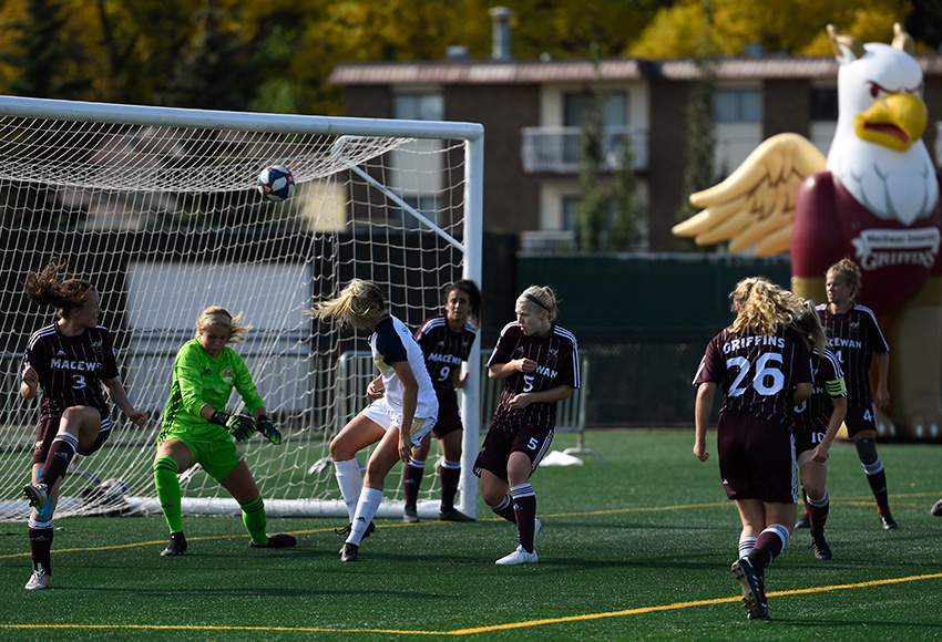TWU's Brooklyn Tidder heads in the game-winner off a corner-kick on Sunday. It's the first goal against the Griffins have conceded this season (Chris Piggott photo).