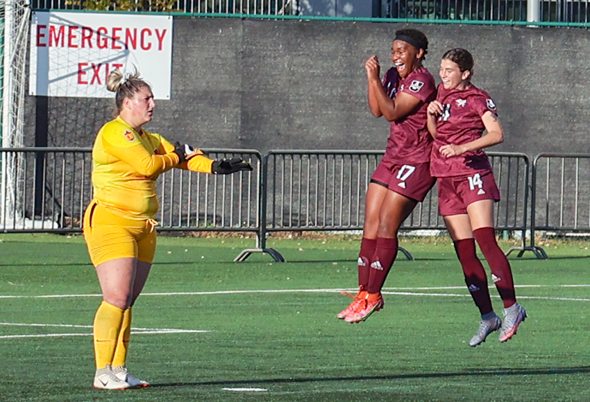 Grace Mwasalla and Anneke Odinga celebrate scoring on Sunday. Mwasalla netted the game winner in the 72nd minute past Calgary goalkeeper Caley Leask (Jefferson Hagen photo).