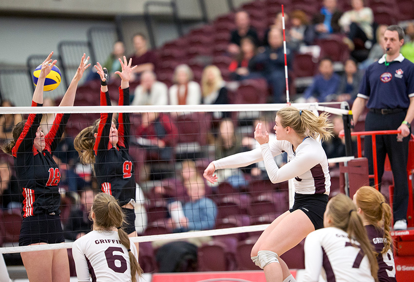 Cassidy Kinsella blasts one through the Winnipeg block on Friday night. She had 23 kills - the fourth-highest single game output of her Canada West career, which will come to an end on Saturday (Robert Antoniuk photo).