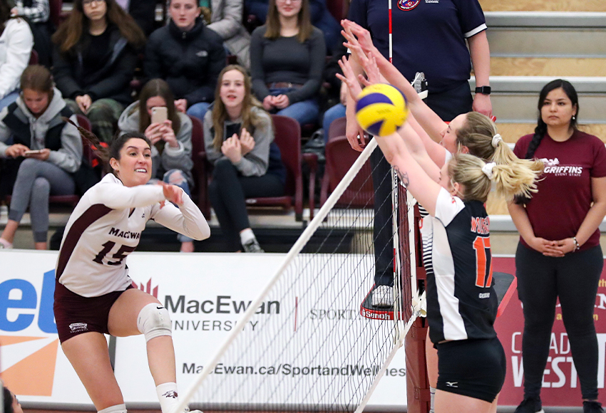Lauren Holmes blasts one of her game-high 17 kills past the Thompson Rivers University block on Friday, but the Griffins lost 3-2 (Eduardo Perez photo).