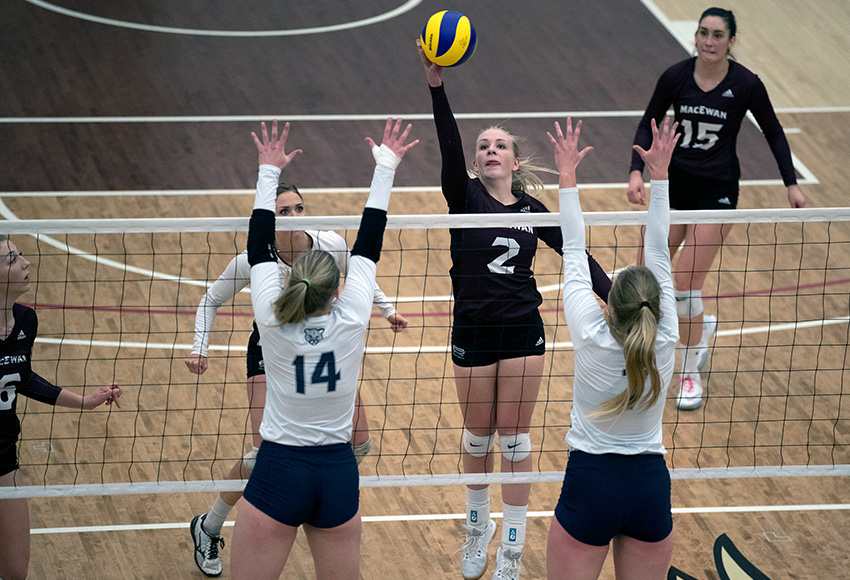 Hailey Cornelis blasts one through the Mount Royal University block during a meeting between the teams last season. MacEwan will kick off its 2019-20 schedule on Oct. 18 at the Calgary institution (Eduardo Perez photo).