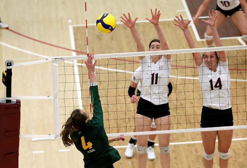 Amelia Anderson and Sarah McGee go up to block an attempt by Alberta's Lauryn Tremblay on Friday (Eduardo Perez photo).