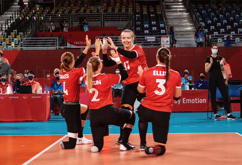 Heidi Peters (centre #11) high-fives her Team Canada sitting volleyball teammates at the Paralympics in Tokyo last month (Courtesy, Heidi Peters).
