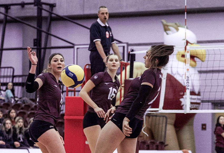 Griffins players dodge a serve that's going out against Alberta on Saturday (Gavin Clarke photo).