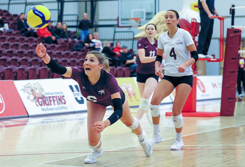 Arden Butler dives for a ball on Saturday. She led the Griffins with 14 kills and seven digs (James Maclennan photo).