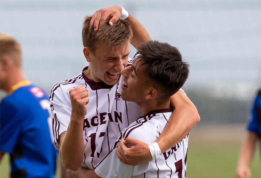 Stefan Gajic, left, celebrates a goal with teammate Michael Enes during MacEwan's 2-2 draw with the Lethbridge Pronghorns on Aug. 25 (MPP Photography).