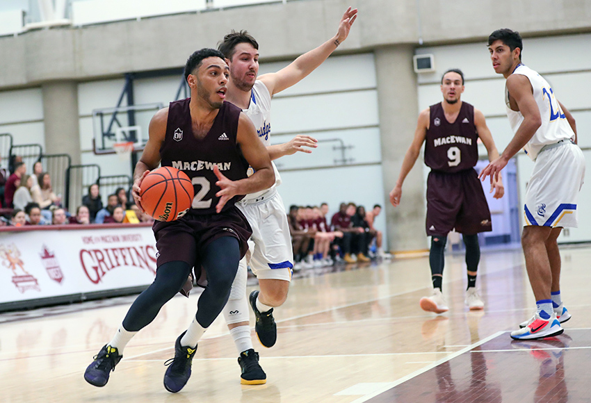 Deonte Doslov-Doctor drives toward the hoop past a Lethbridge defender on Saturday night. The guard, who has played the most Canada West minutes of any Griffins player, was playing in his final home game (Eduardo Perez photo).