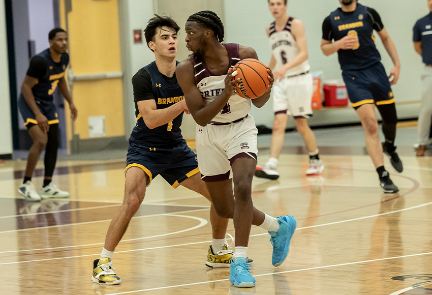 Matthew Osunde almost had a triple double, recording 21 points, 11 rebounds and eight assists in MacEwan's heartbreaking 80-78 overtime loss to Brandon (Rebecca Chelmick photo).