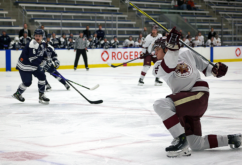 Carter Chorney unleashes a slapshot in MacEwan's 3-2 win over Mount Royal back in November. The Griffins head into a best-of-three quarter-final series against the Cougars in Calgary this weekend (Jefferson Hagen photo).