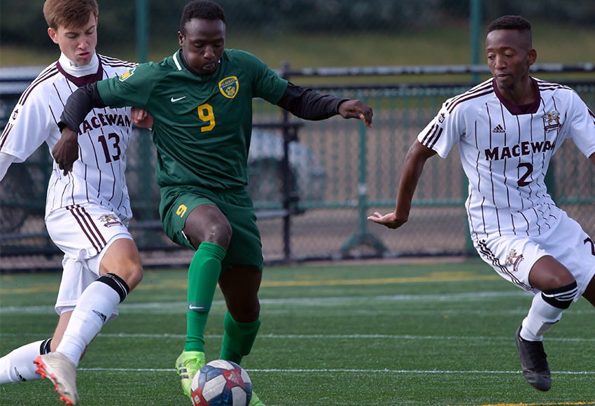 Former Griffin Lahai Mansaray, shown going against Stefan Gajic, left, and Zibusiso Moyo on Saturday, had two points against his old team in Sunday's 3-0 Alberta win (Chris Piggott photo).