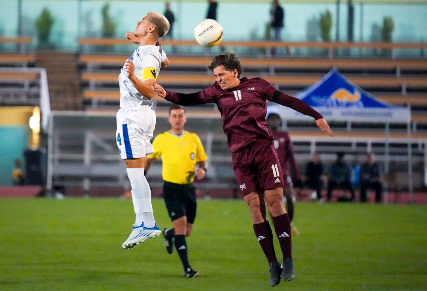 MacEwan's Nicholas Luczkiewicz elevates for a header against Victoria last weekend. The Griffins visit the Alberta Golden Bears on Saturday (apshutter.com).