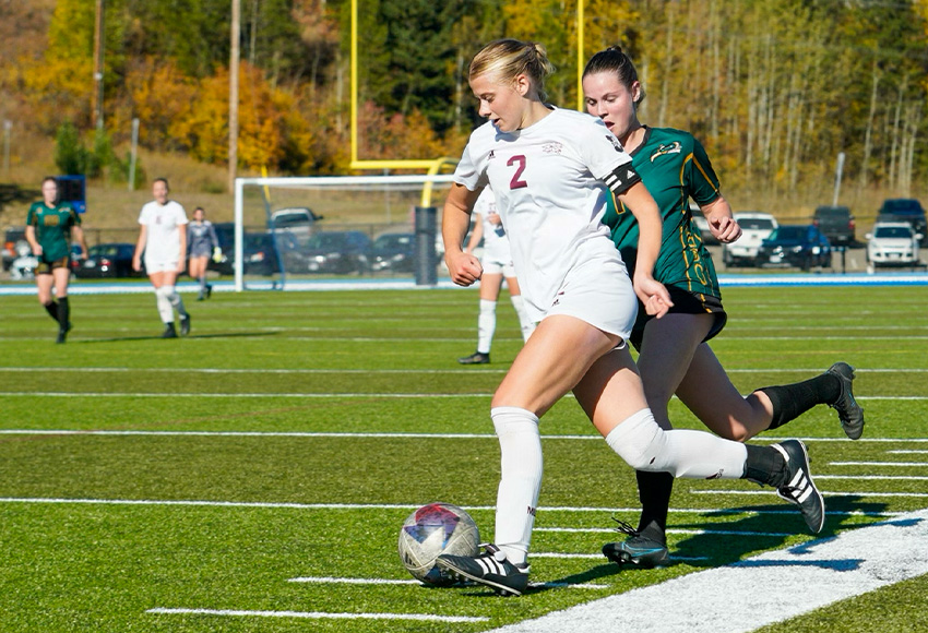 Hannah Supina gets around a UNBC defender on Sunday. The Griffins captain scored the game-winner off a PK in the 71st minute (Rich Abney photo).