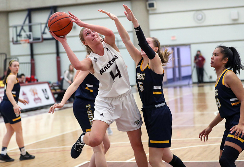 Shannon Majeau throws some body english into a shot under pressure from UBC's defence on Friday. She lead MacEwan with 14 points (Eduardo Perez photo).