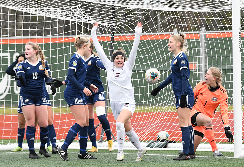Meagan Lemoine celebrates after scoring in overtime for the Griffins in their U SPORTS semifinal win over UBC on Saturday (Vaughn Merchant photo).