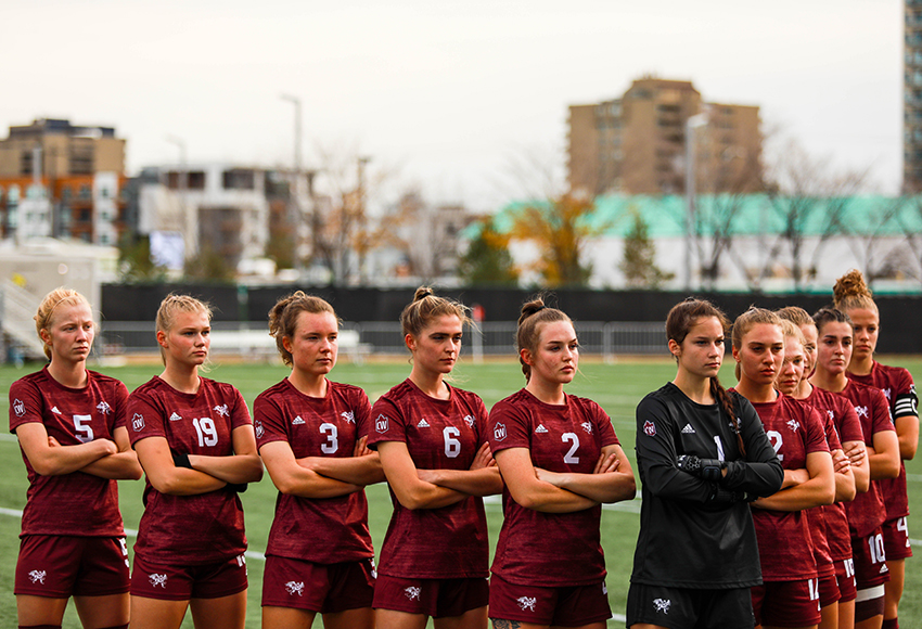 MacEwan's starters pose for a picture before a game earlier this season. The team is defined by their 'We Before Me' slogan (Tia Schram photo).